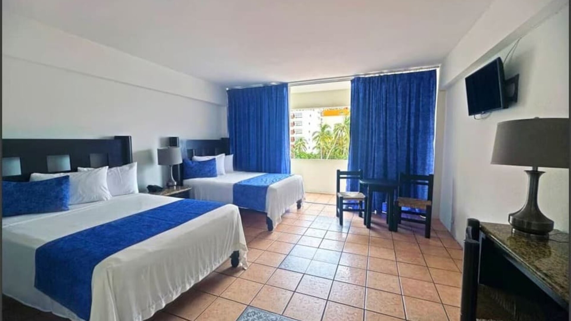 Spacious day use room with natural light at Hotel Delfin PV Beach Resort.