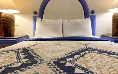 Romantic king room at Puerto De Luna Pet Friendly & Family Suites.