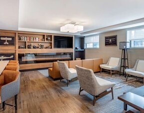 Coworking lounge at Comfort Inn JFK Airport.