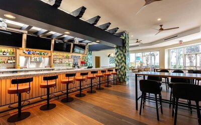 Hotel bar at Embassy Suites By Hilton Deerfield Beach Resort & Spa.