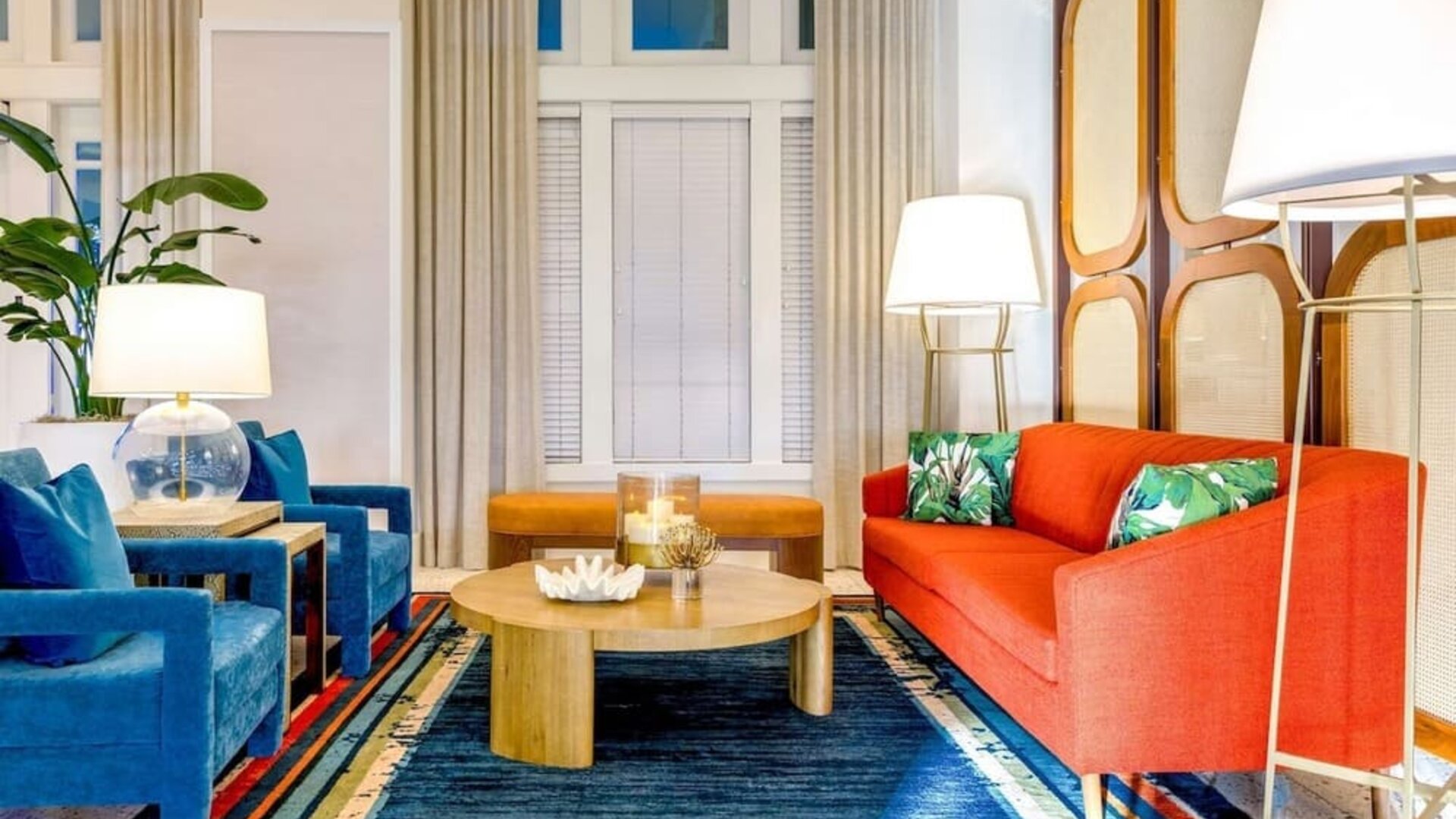 Coworking space and lobby seating at Embassy Suites By Hilton Deerfield Beach Resort & Spa.