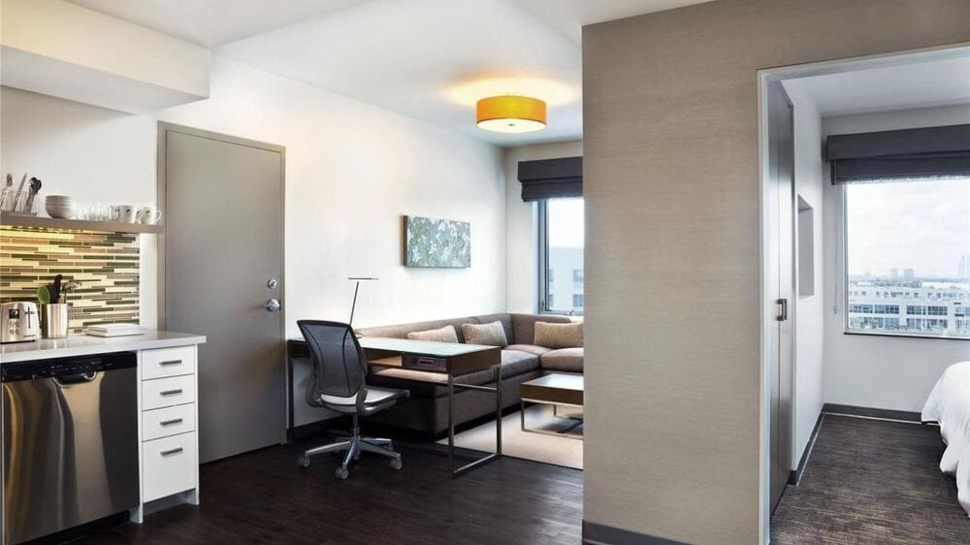 One room suite with dining area at Element Miami Doral.