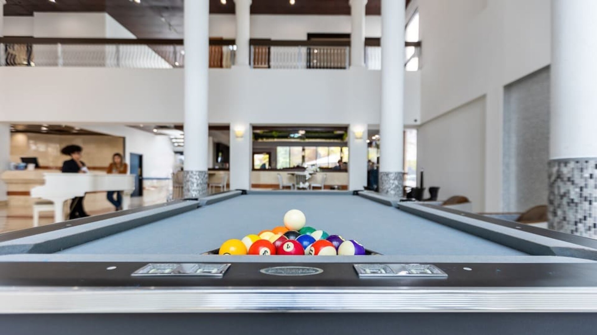 Game room and pool table at Regency Miami Airport By Sonesta.