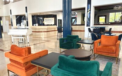 Lobby and lounge at Regency Miami Airport By Sonesta.