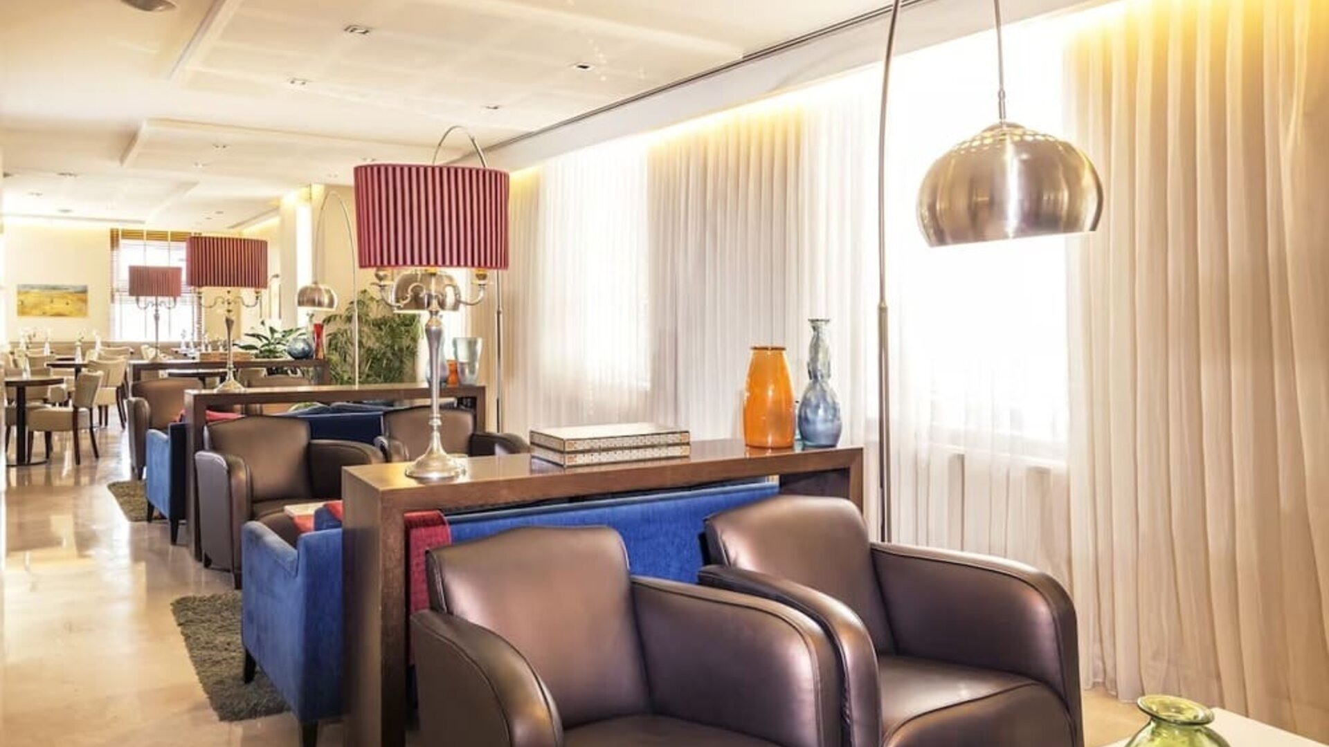 Lobby and lounge seating at Prima Royale Hotel.