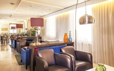 Lobby and lounge seating at Prima Royale Hotel.