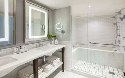 Guest bathroom with shower at InterContinental New York Barclay.