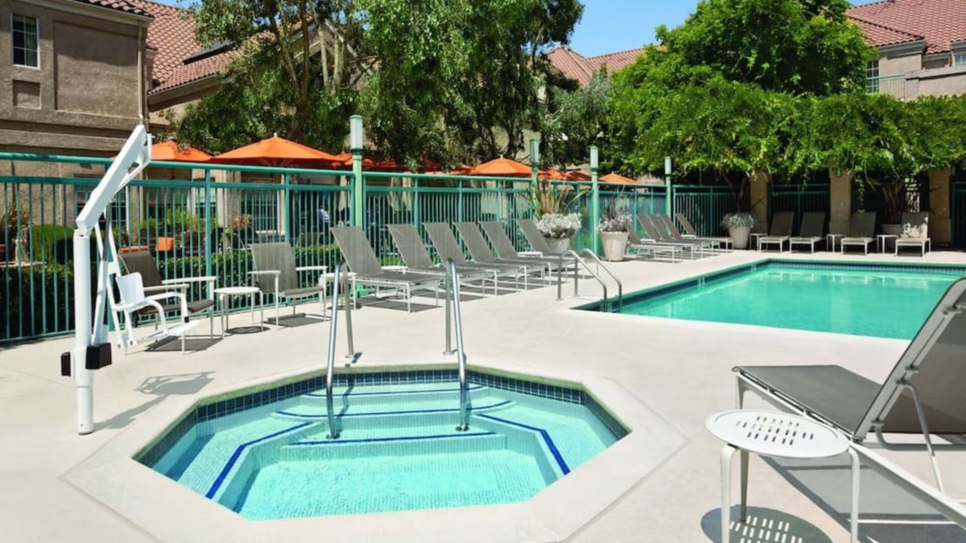 Outdoor pool area at Hyatt House Pleasanton.
