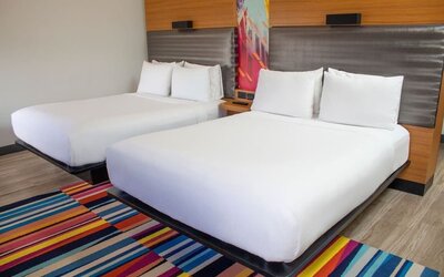 Day use room with two beds at Aloft Miami Doral.
