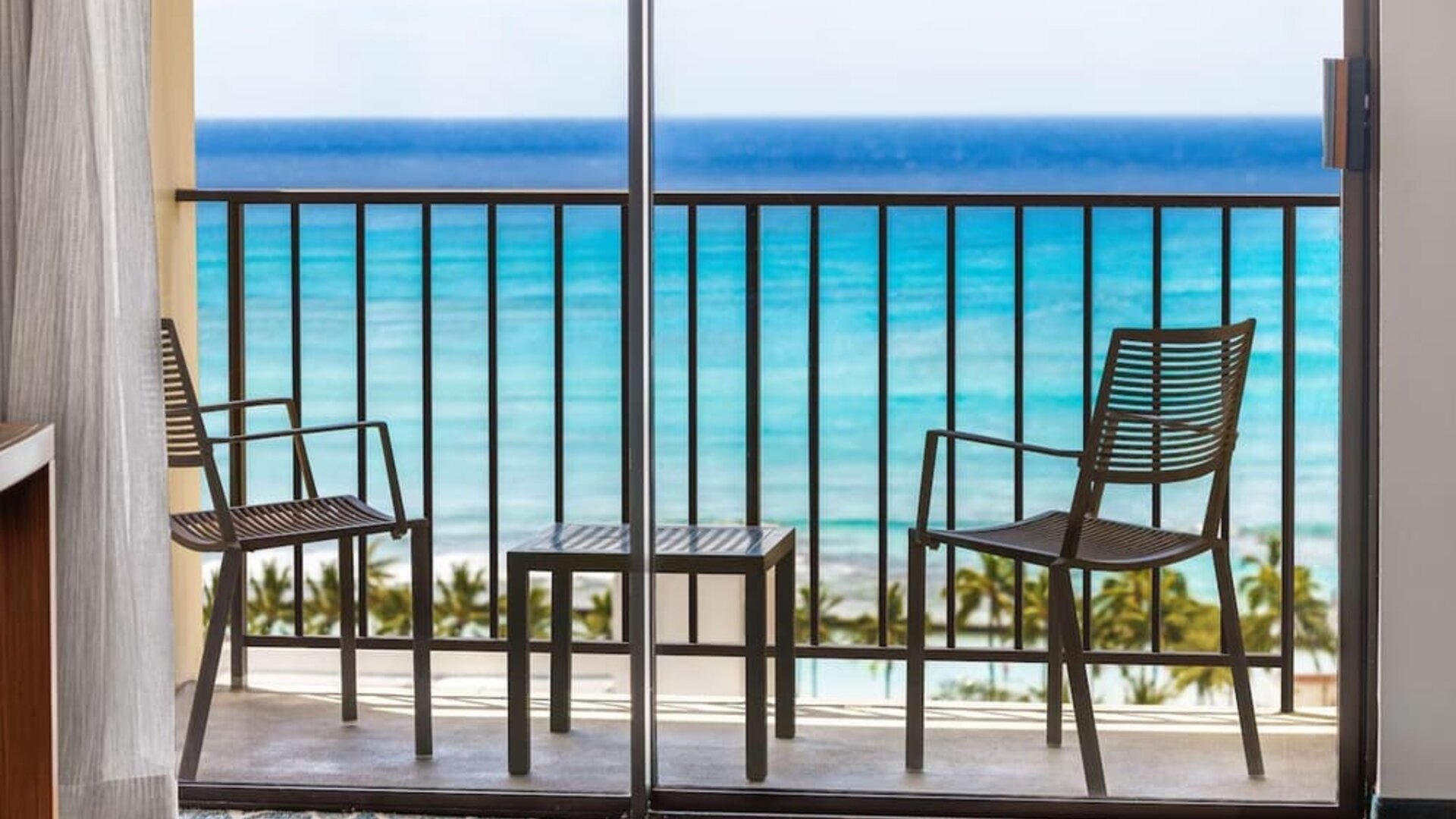 Day room with balcony and sea view at Hyatt Place Waikiki Beach.
