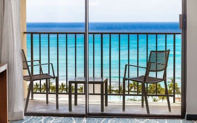Day room with balcony and sea view at Hyatt Place Waikiki Beach.