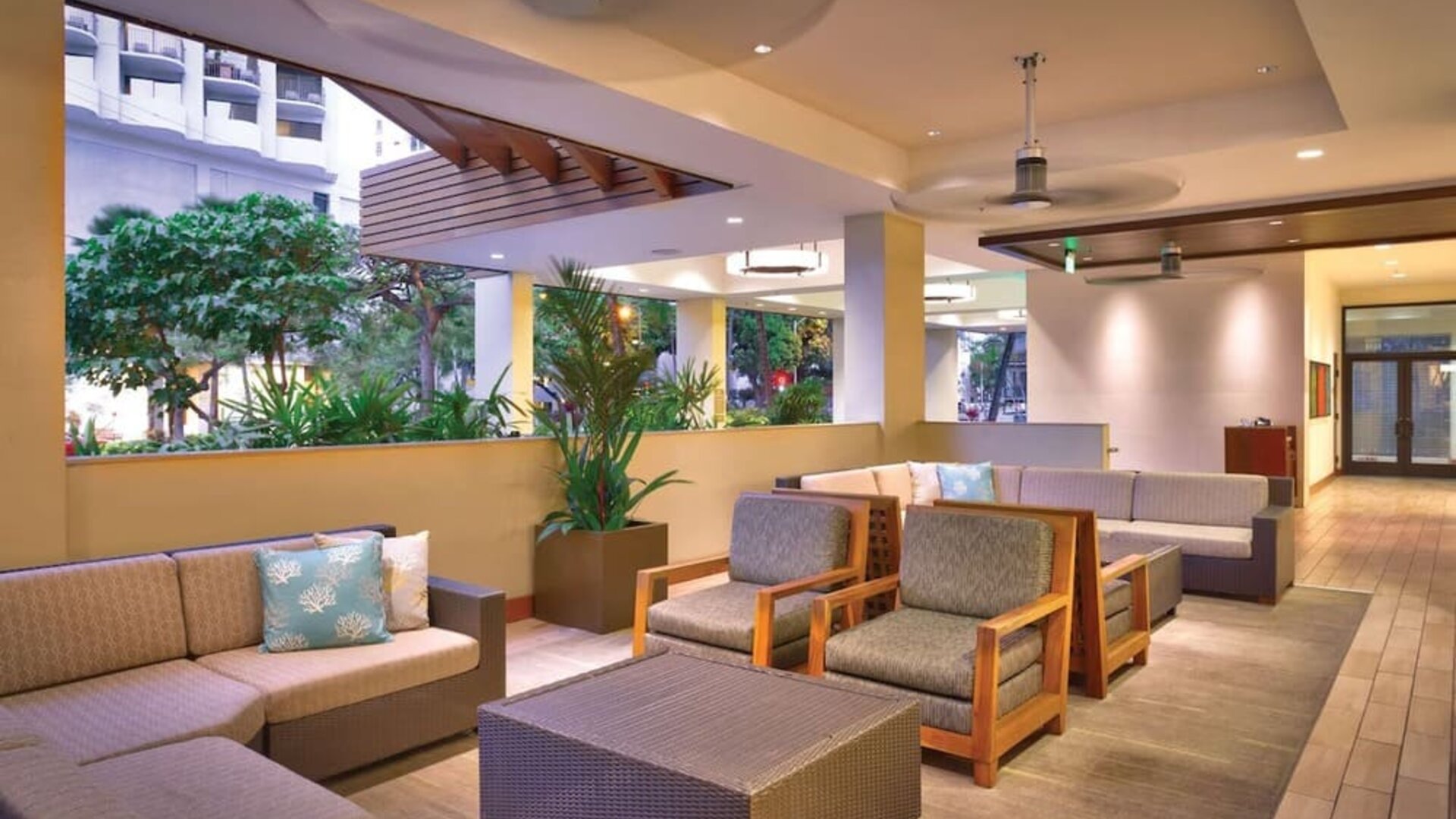 Lounge and coworking space at Hyatt Place Waikiki Beach.