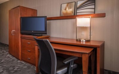 Business desk and TV at Courtyard Dulles Airport Chantilly.