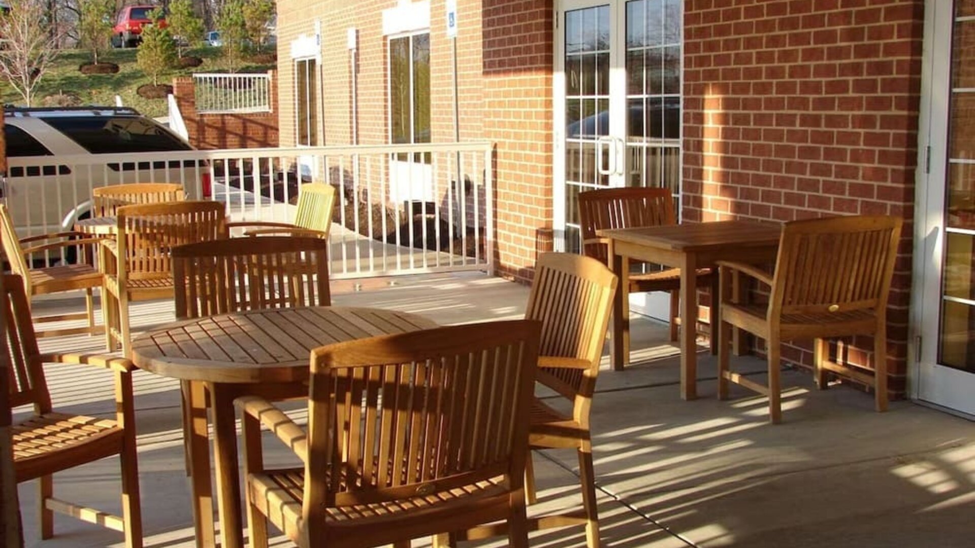 Outdoor seating and terrace at Country Inn & Suites By Radisson, BWI Airport.