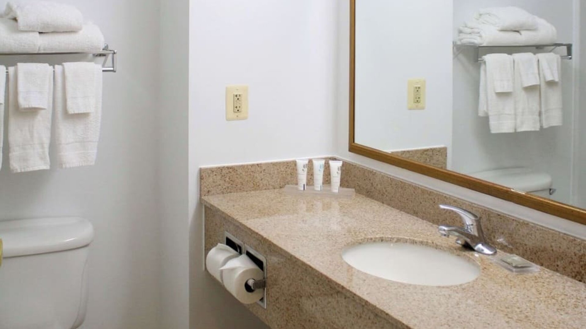 Bathroom with shower at Country Inn & Suites By Radisson, BWI Airport.