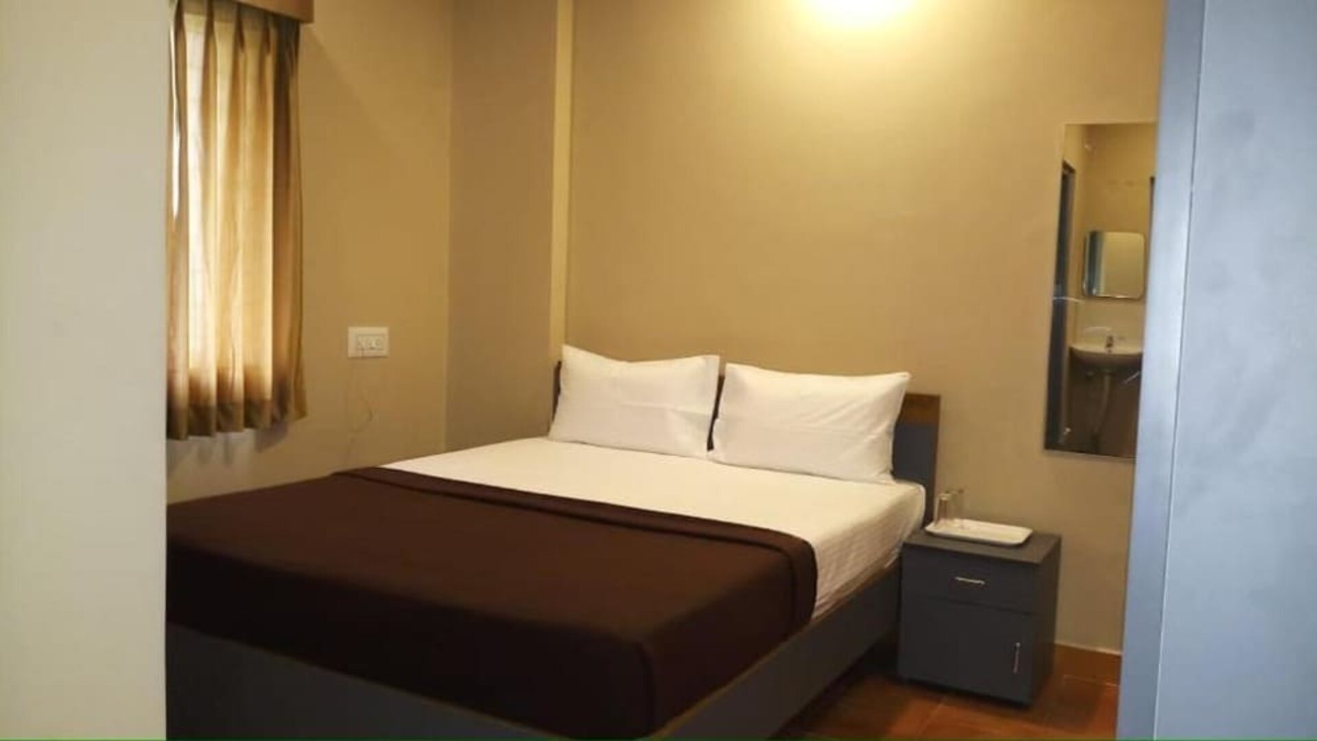 Romantic king room at The Nisarga Residency.