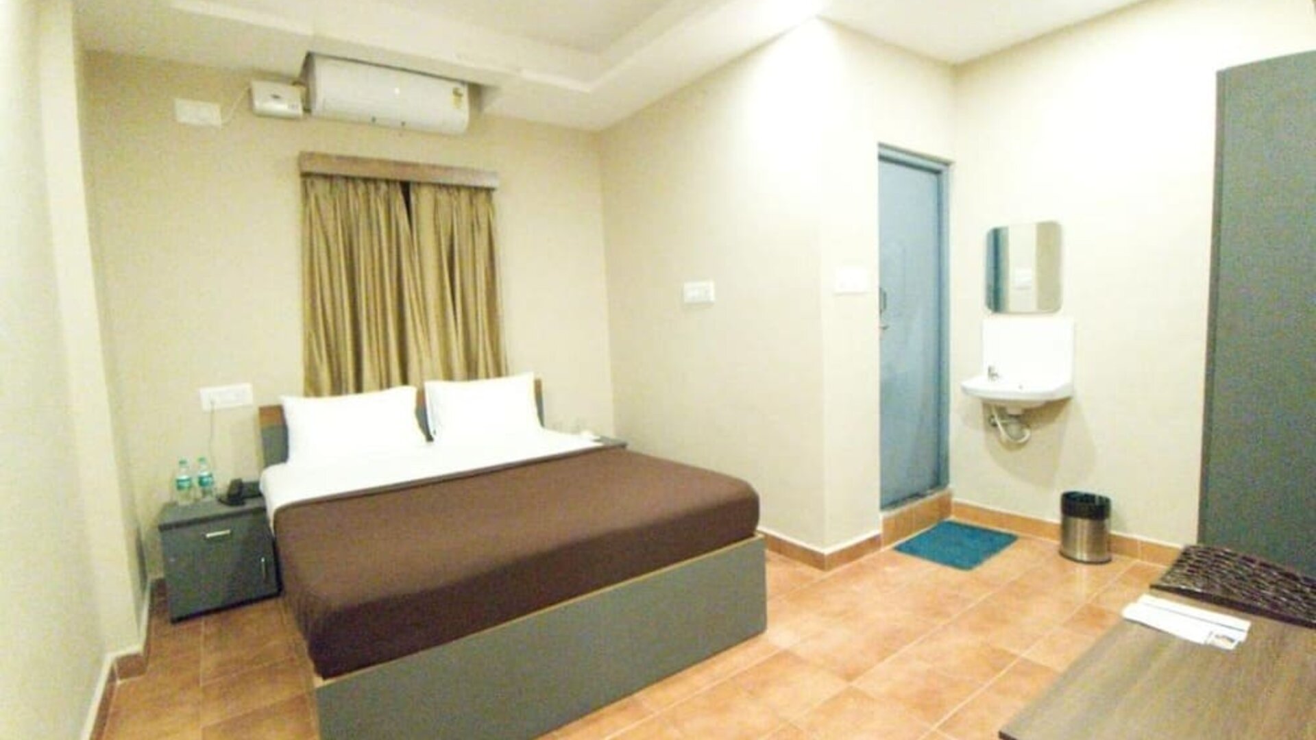 Cozy king room at The Nisarga Residency.