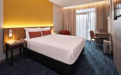 Romantic king room at Rydges Sydney Airport Hotel.