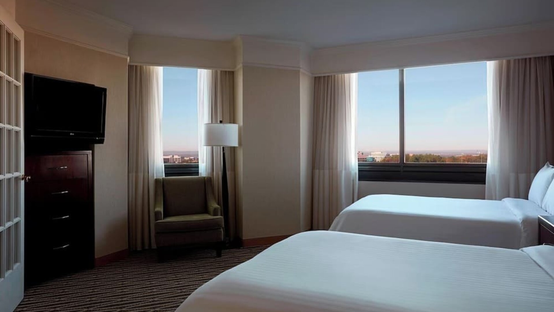 Day room with two queen beds at Washington Dulles Marriott Suites.