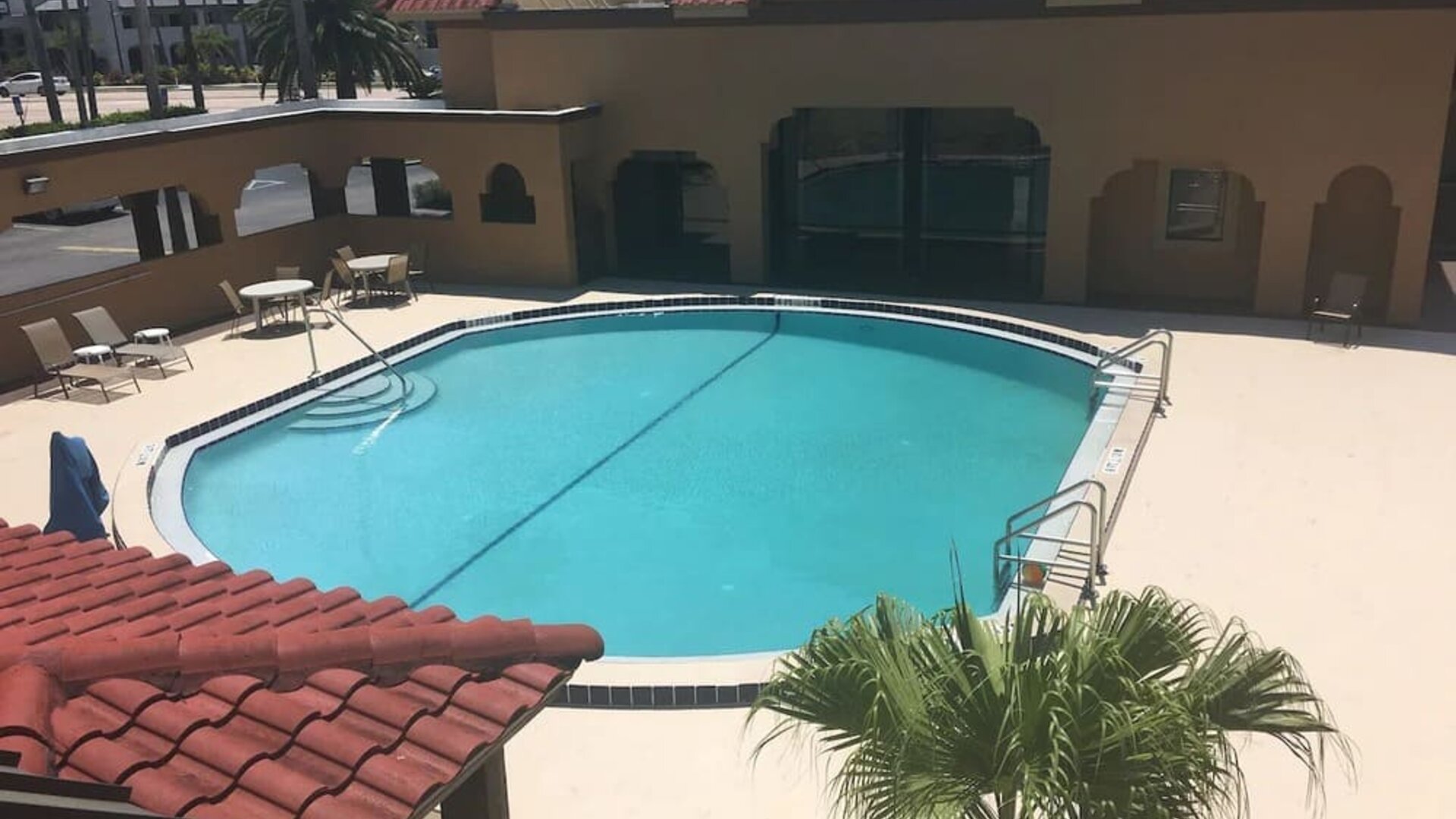 Outdoor pool area at Days Inn By Wyndham St Augustine/Historic Downtown.