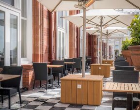Outdoor seating at DoubleTree By Hilton Brighton Metropole.
