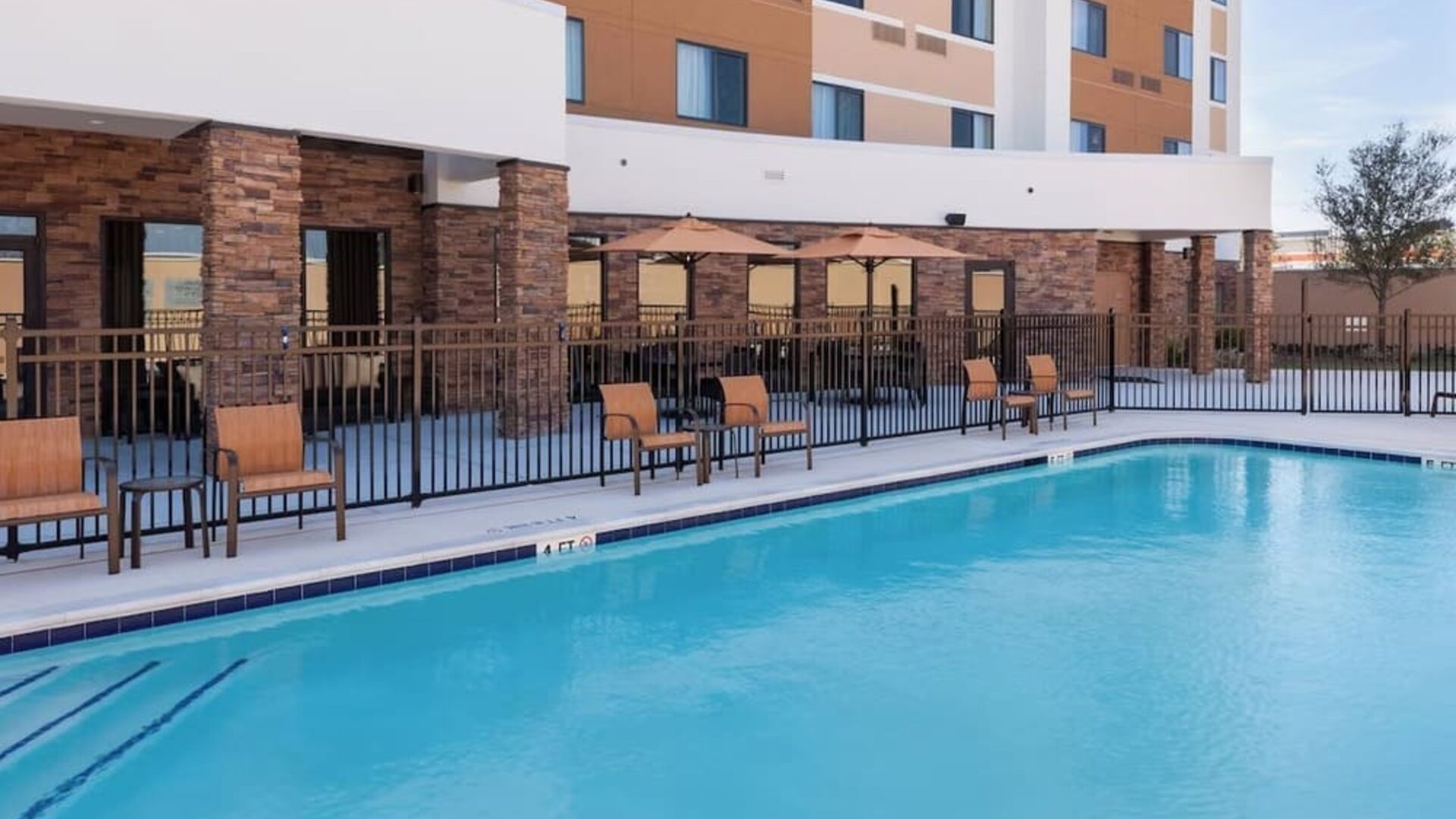 Refreshing outdoor pool at Courtyard By Marriott Houston North/ Shenandoah.