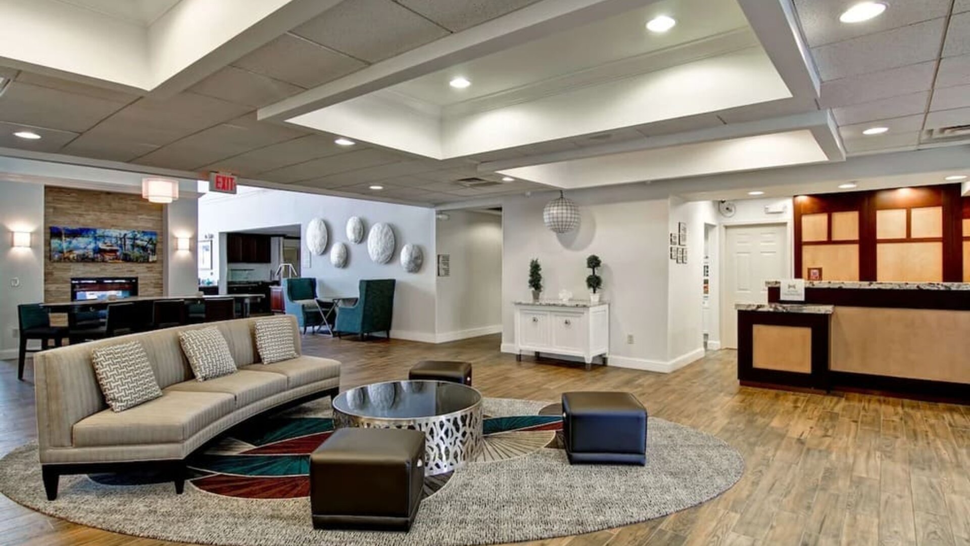 Lobby and coworking lounge at Homewood Suites By Hilton Newark-Cranford.