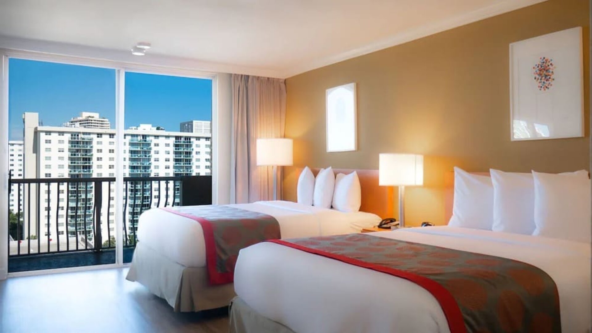 Two queen beds at Ramada Plaza Marco Polo Beach Resort.