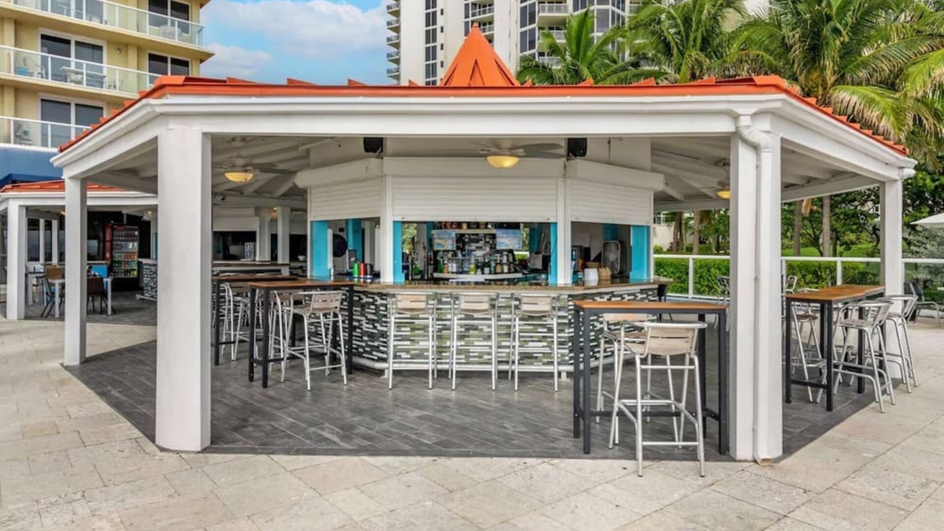 Hotel bar and coworking space at Ramada Plaza Marco Polo Beach Resort.