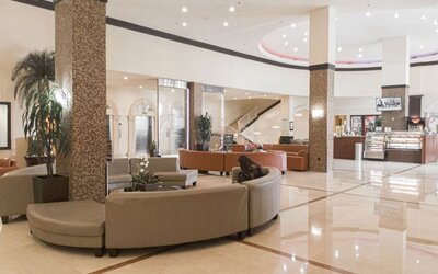 Lobby seating at Ramada Plaza Marco Polo Beach Resort.