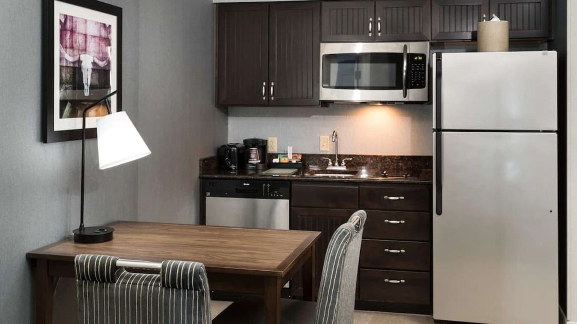 Day room with kitchen at Homewood Suites By Hilton Austin NW Near The Domain.