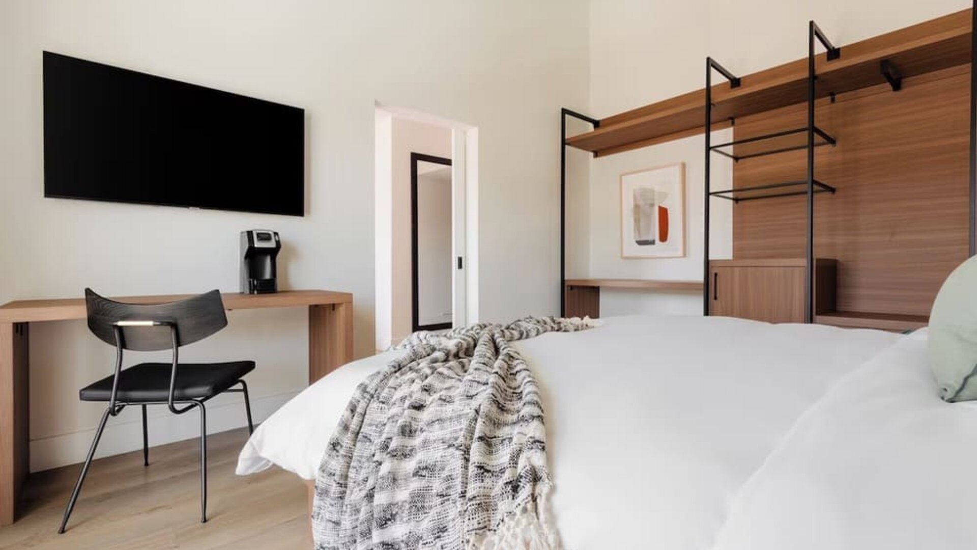 Romantic king room with TV at Lum Hotel Inglewood.