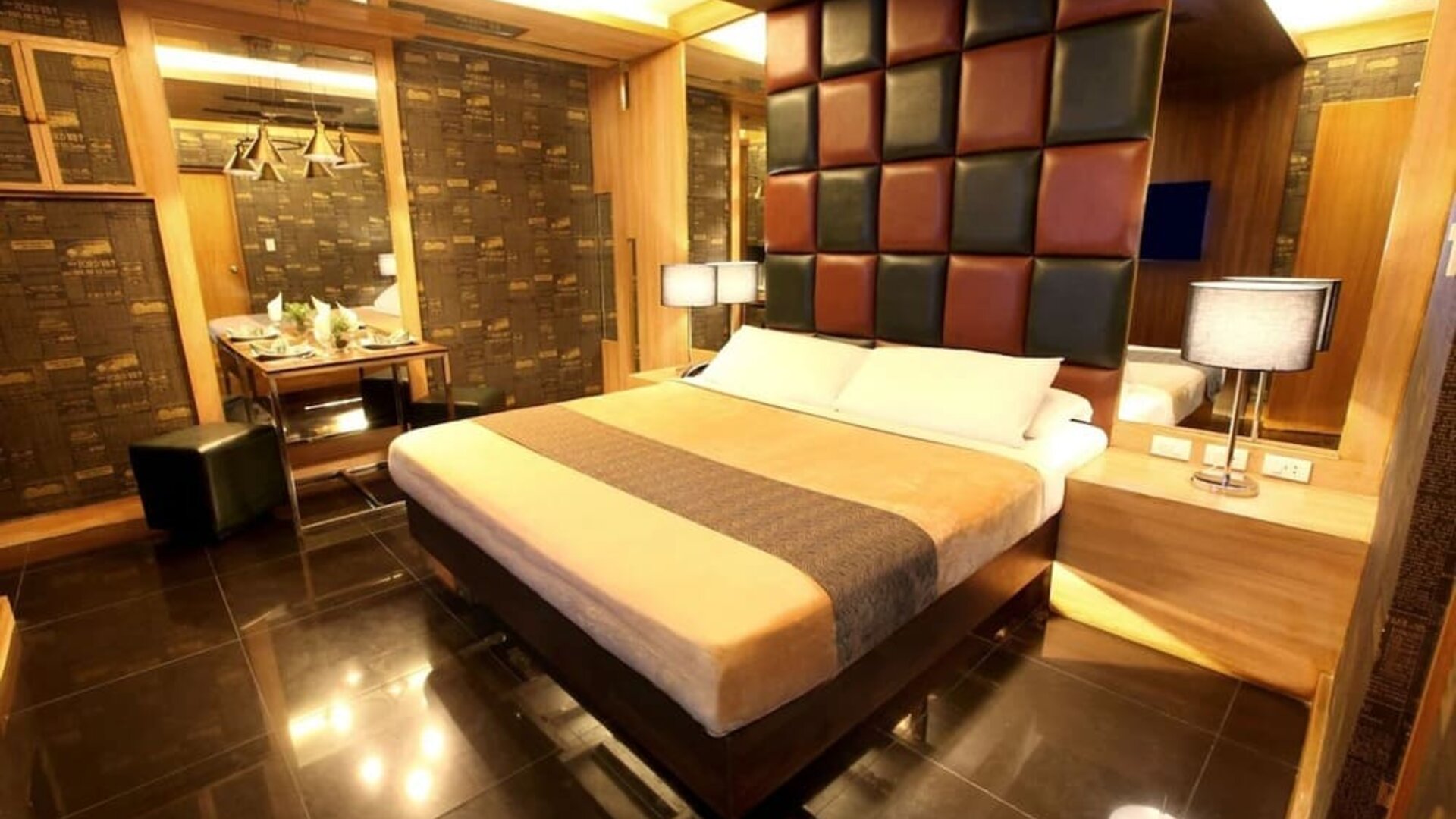 Cozy king room at Victoria Court Las Piñas.