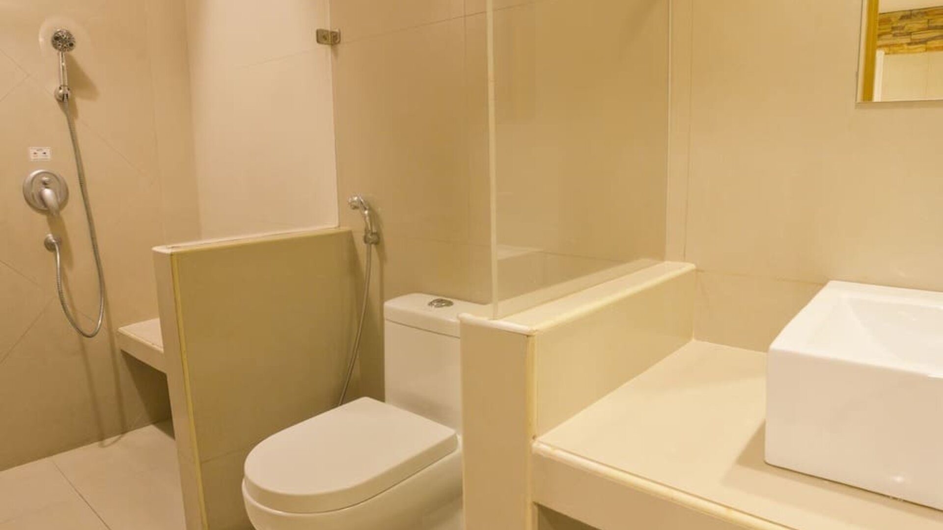 Guest bathroom with shower at Victoria Court Las Piñas.
