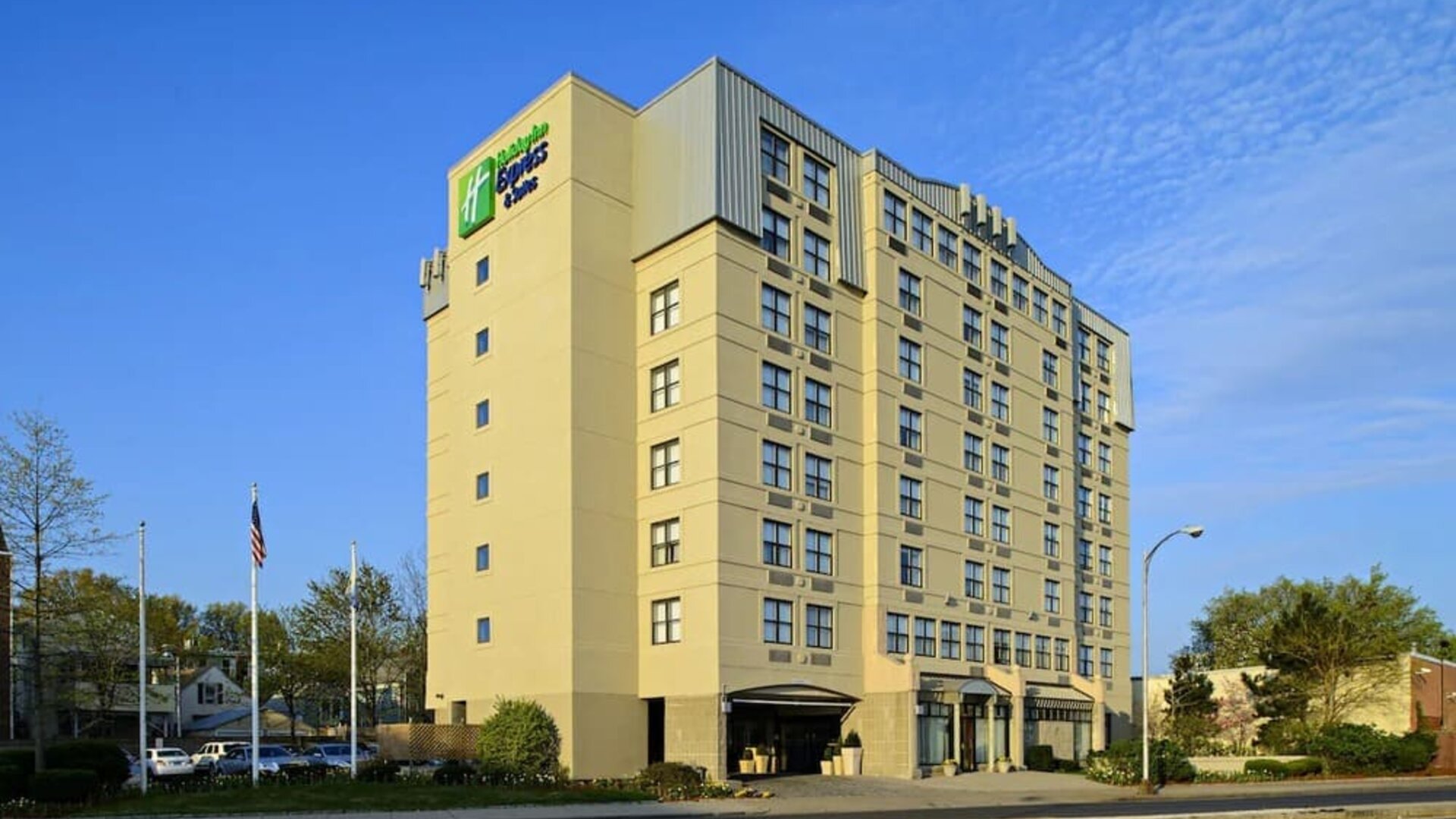 Exterior view of Holiday Inn Express & Suites Boston-Cambridge showcasing its modern architecture and convenient urban location.