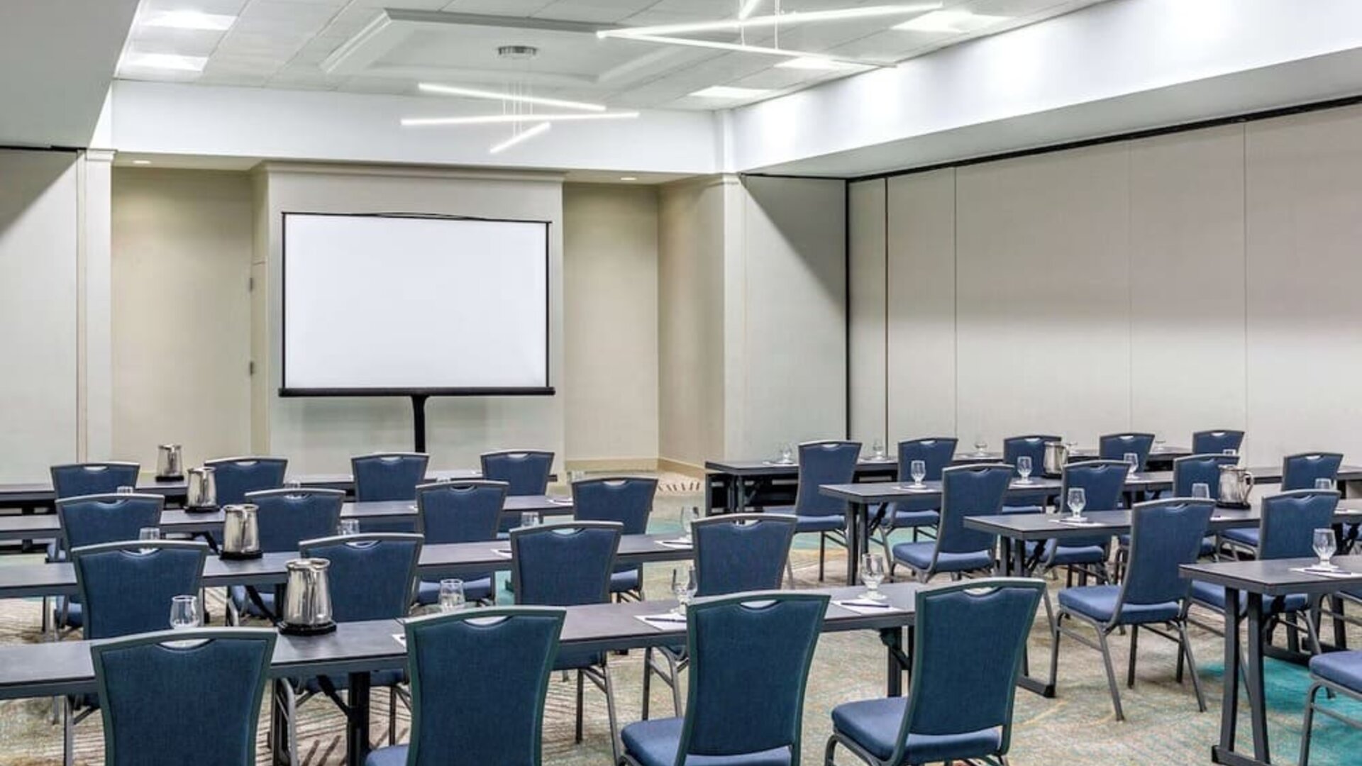 Flexible event and conference venue featuring classroom-style seating and modern audiovisual capabilities for meetings and special events at DoubleTree by Hilton Westborough.