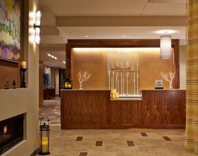 Welcoming reception area featuring contemporary design, warm hospitality, and convenient guest services at Hilton Garden Inn Boston/Marlborough.