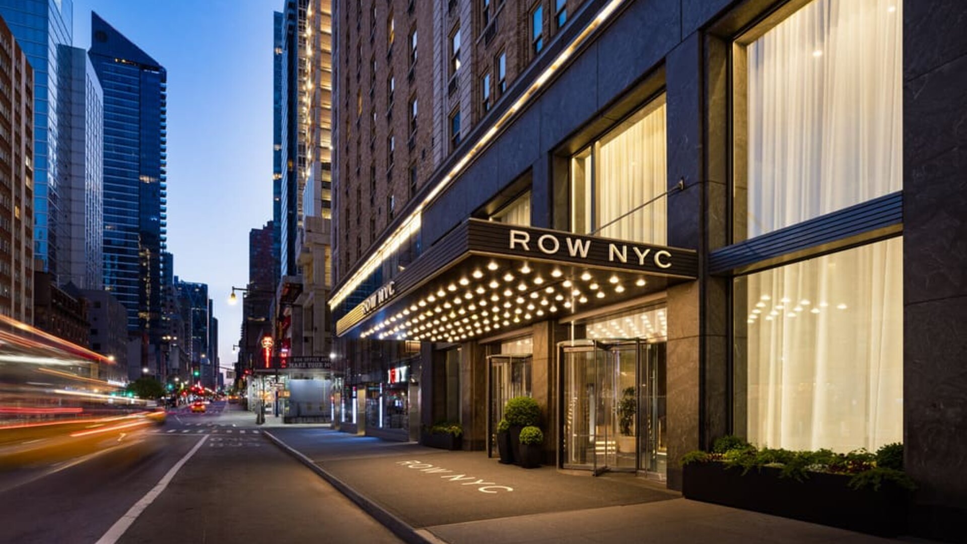Exterior view of Row NYC showcasing its prime Midtown Manhattan location near iconic attractions, entertainment, and dining destinations.