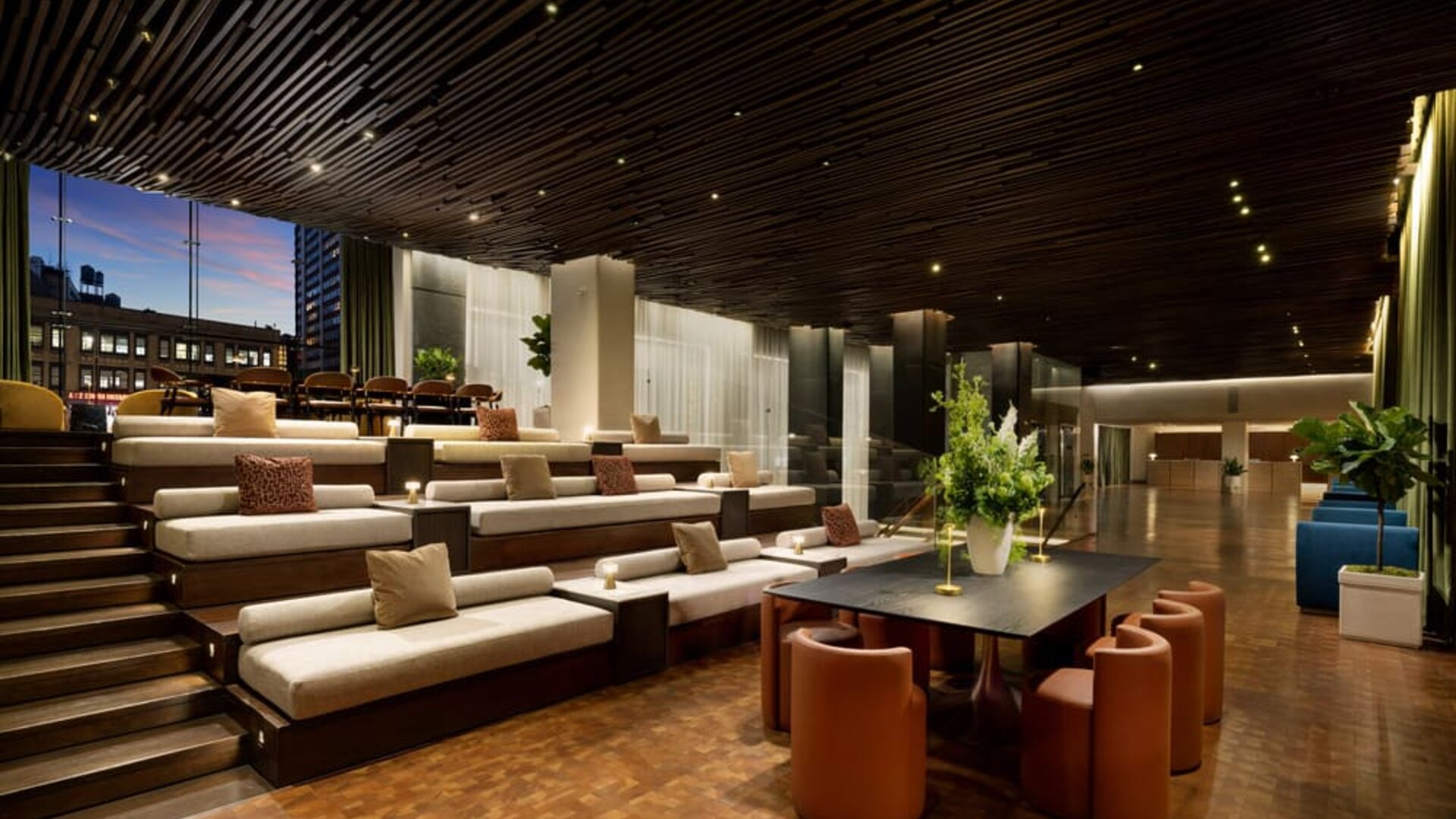 Elegant lobby area featuring contemporary décor, comfortable seating, and open spaces designed for relaxation and social interaction at Row NYC.