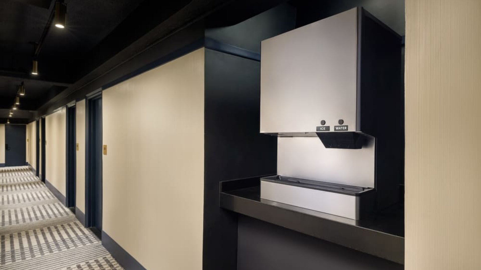 Convenient guest hydration station providing complimentary ice and water access along the guest room corridor at Row NYC.