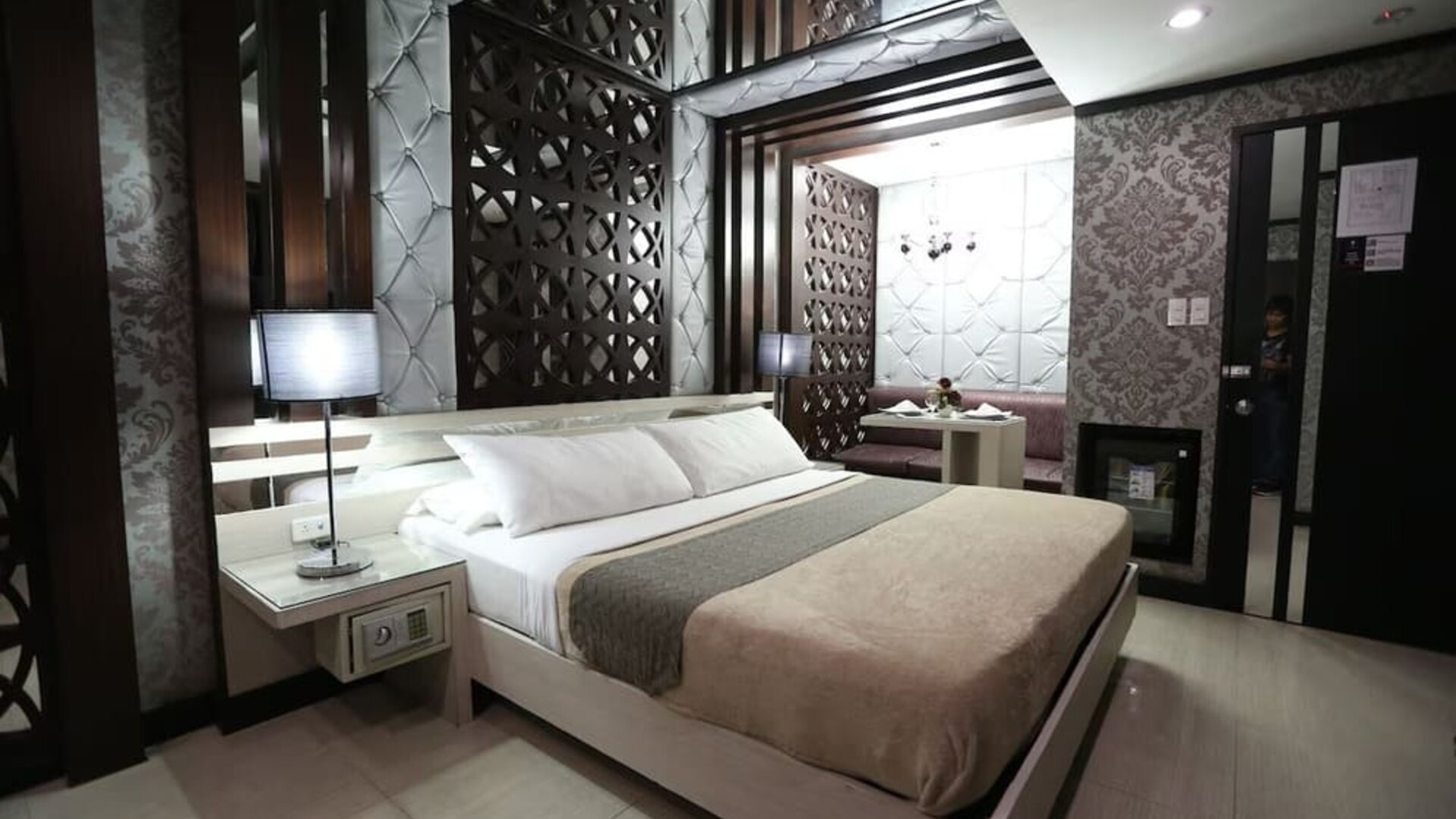 Cozy king room at Victoria Court Hillcrest.