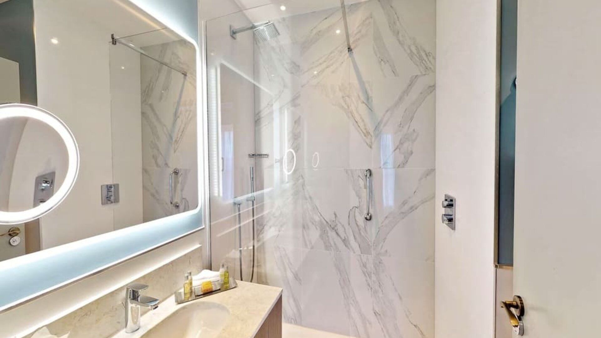 Guest bathroom with shower at DoubleTree By Hilton London Angel Kings Cross.