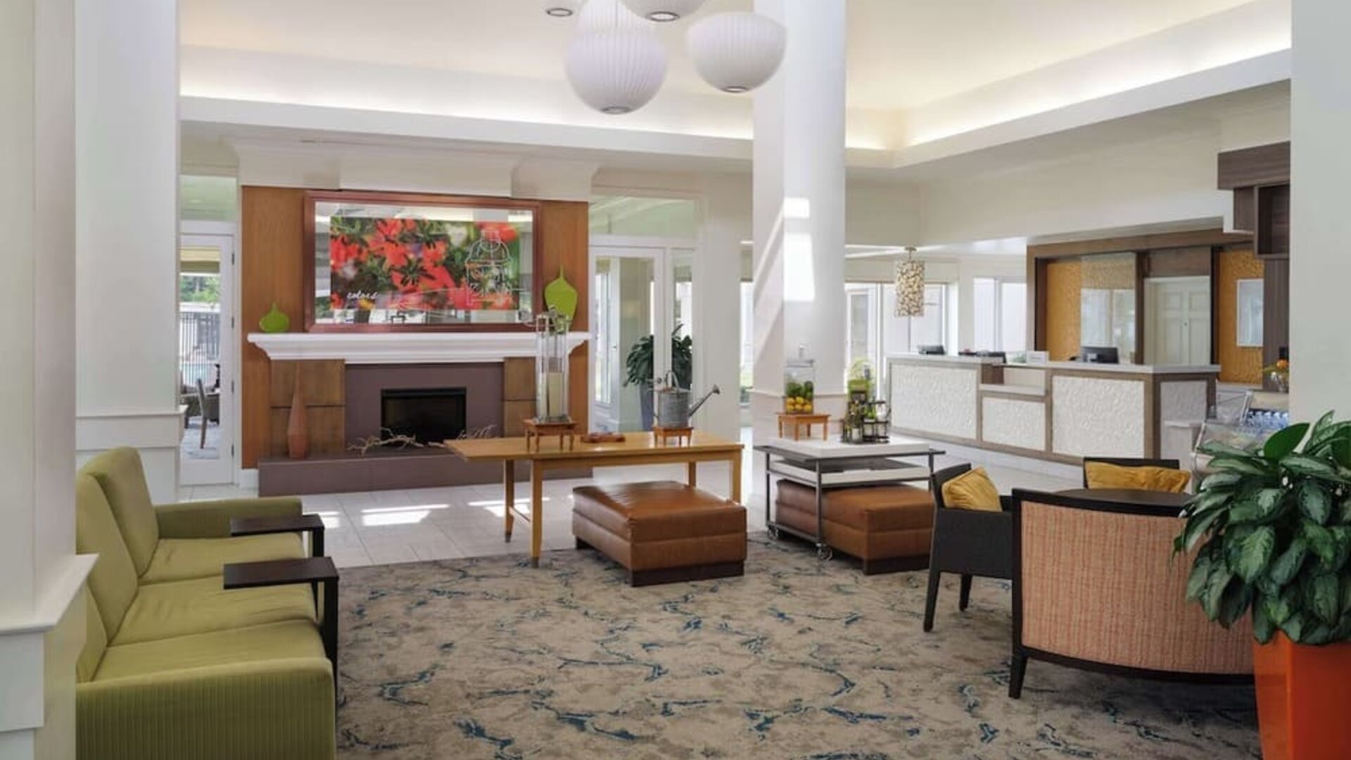 Lobby and coworking lounge at Hilton Garden Inn IAH Houston.