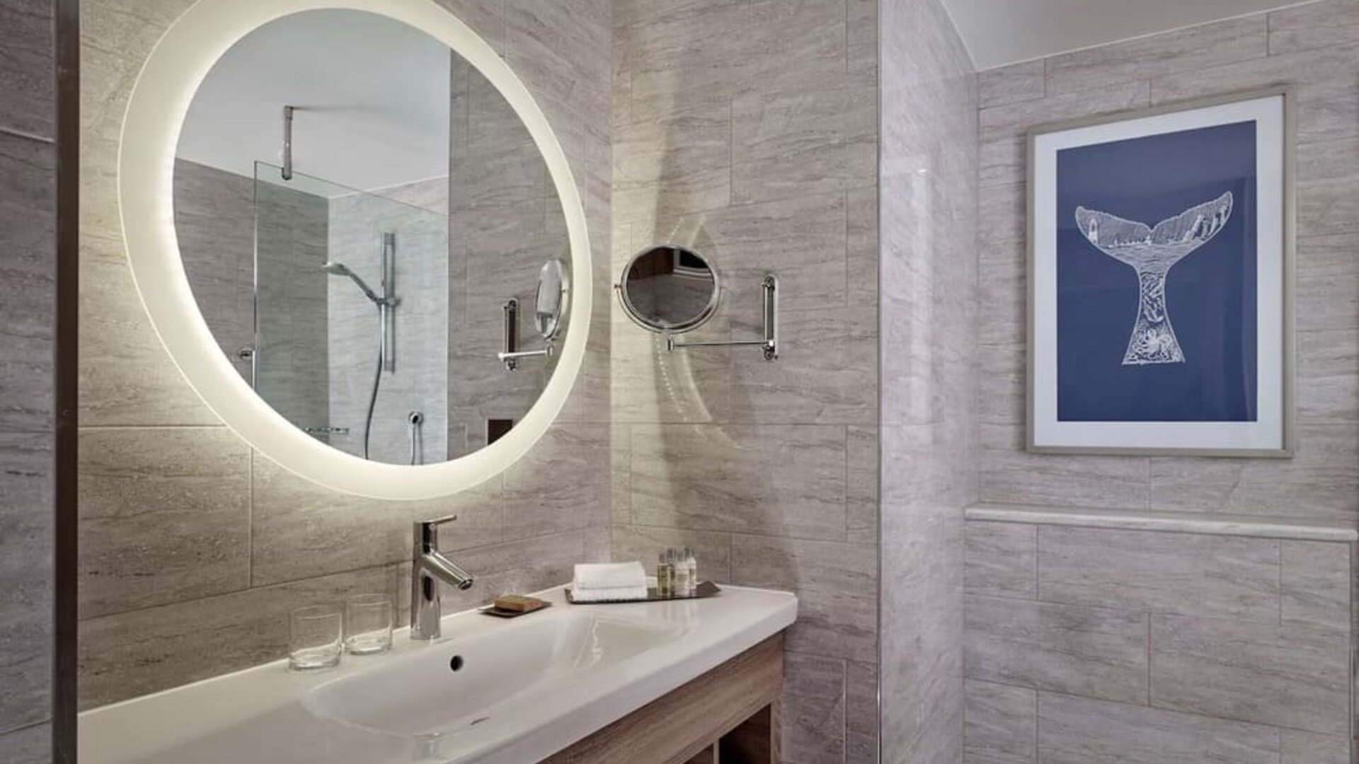 Guest bathroom with shower at DoubleTree By Hilton Hull.