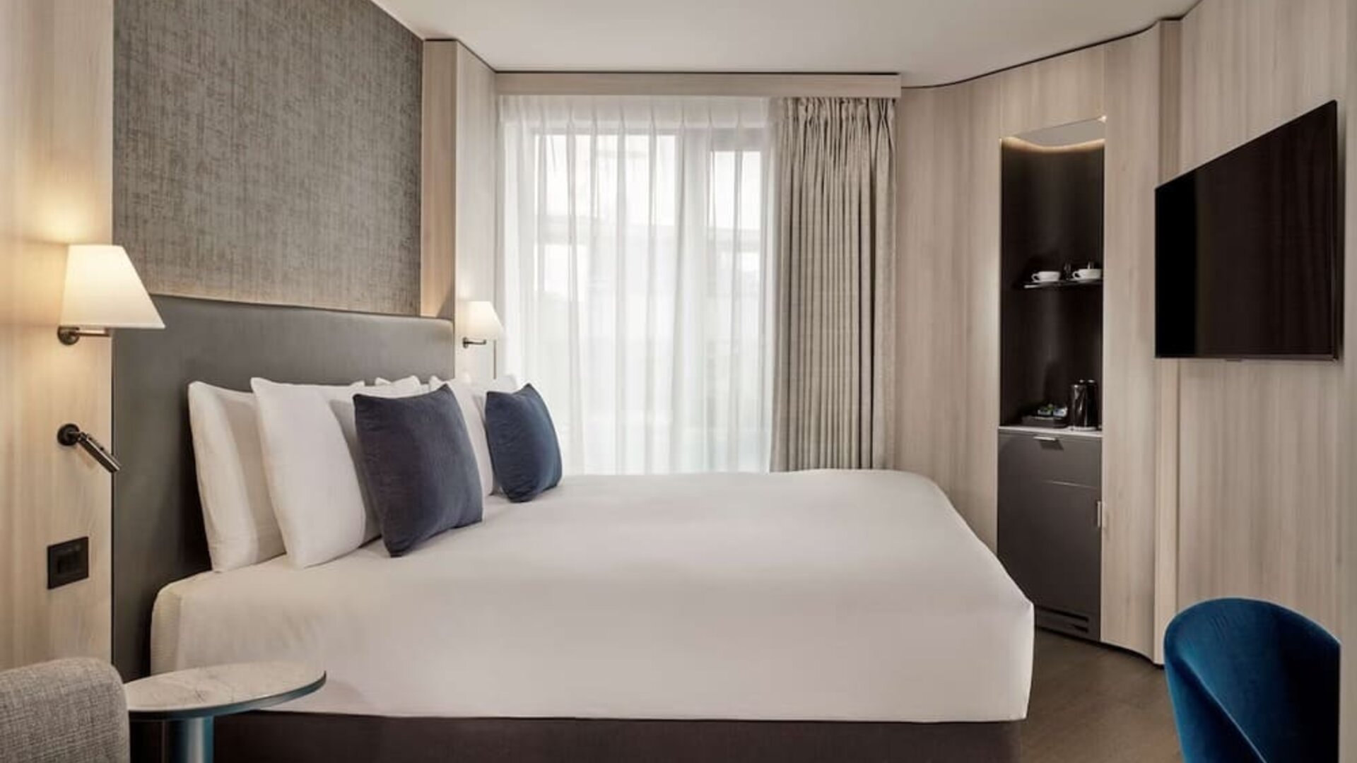 Elegant day room with natural light at The Westminster London, Curio Collection By Hilton.  
