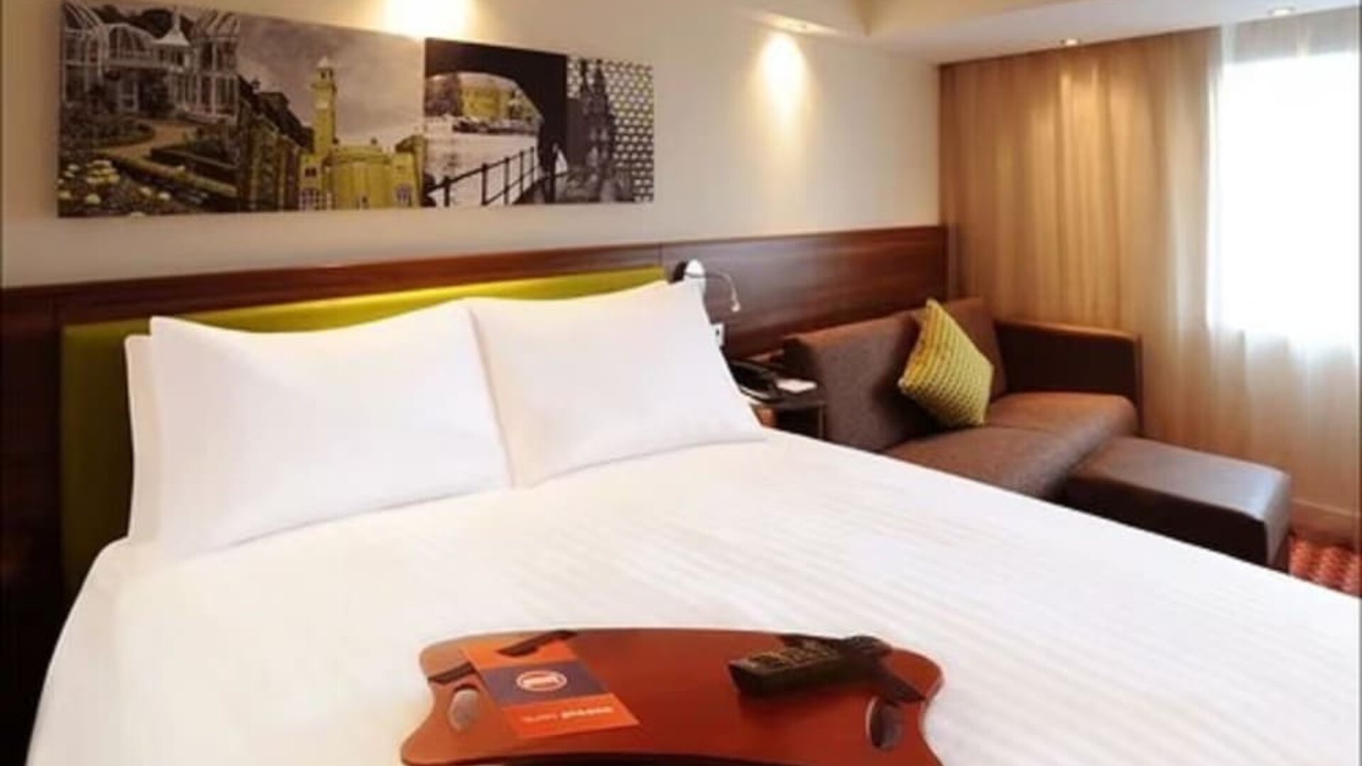 Day use room with sofa at Hampton By Hilton London Luton Airport.