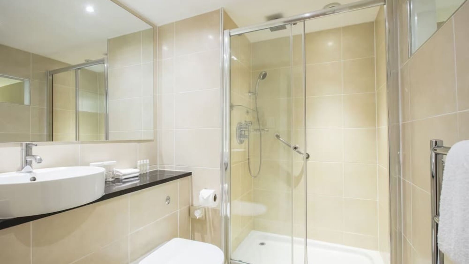 Guest bathroom with shower at DoubleTree By Hilton Hotel & Spa Chester.