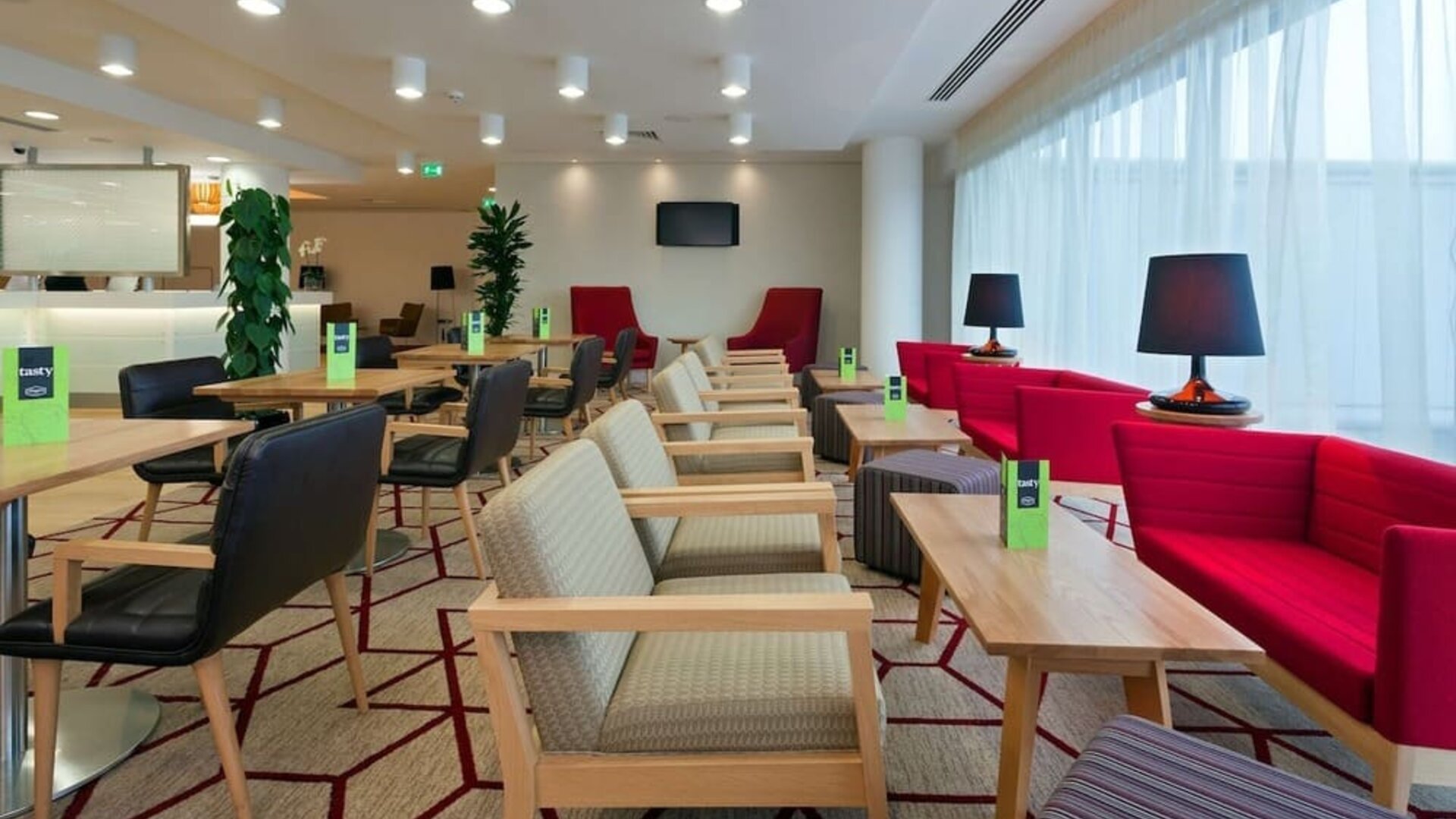 Lounge and coworking space at Hampton By Hilton London Gatwick Airport.