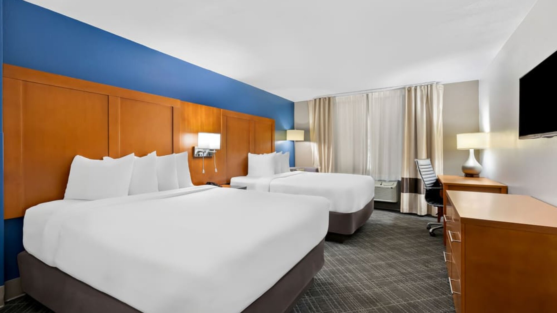 Queen room with TV at Comfort Inn & Suites Nashville.