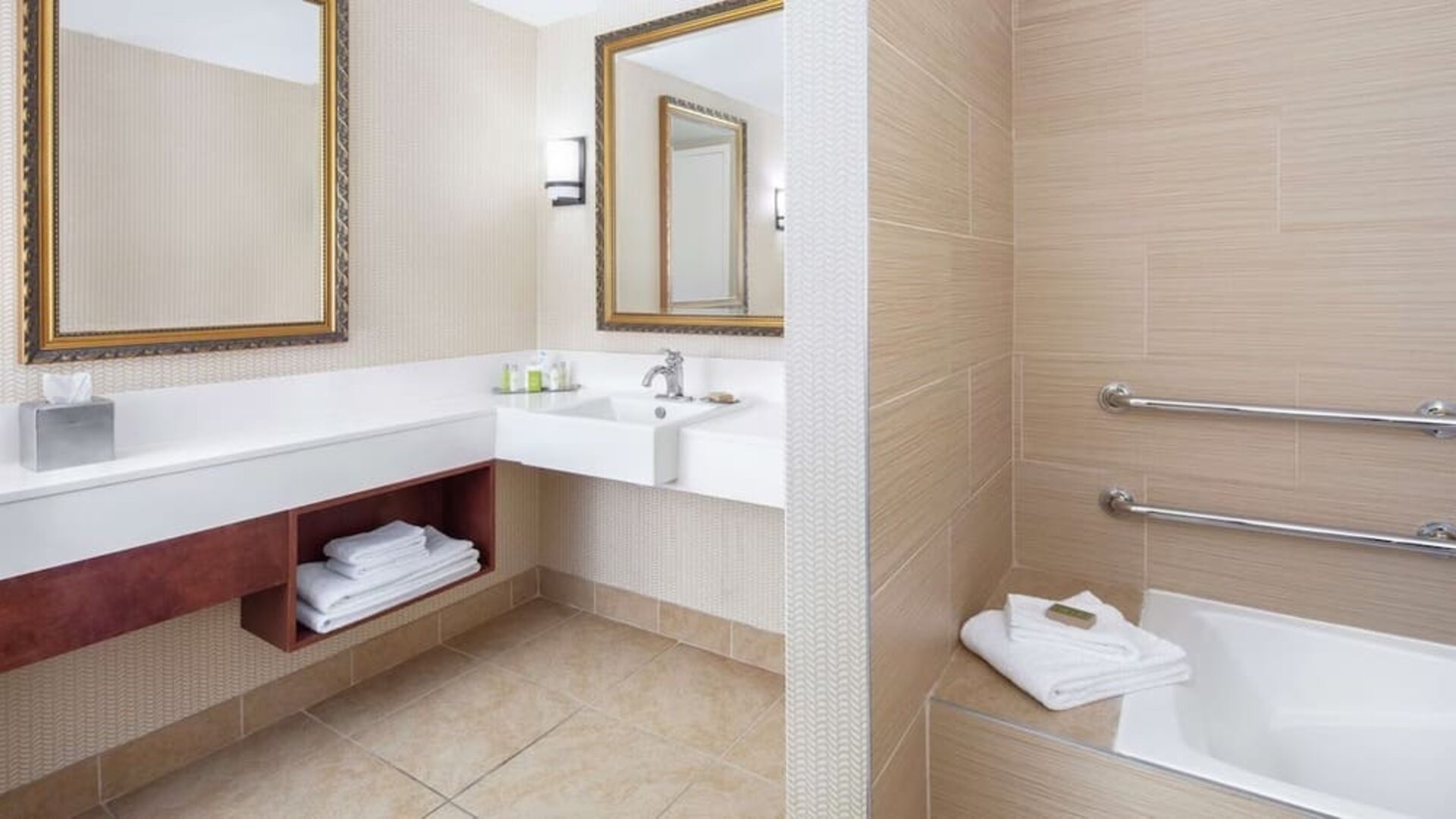 Guest bathroom with tub at DoubleTree By Hilton Sunrise.